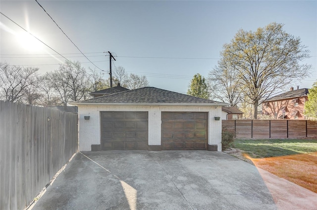 detached garage with fence