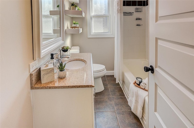 bathroom with toilet, shower / bath combo, vanity, and baseboards