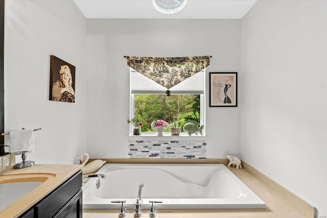 full bath featuring a bath and vanity