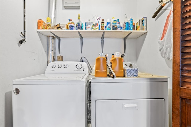 laundry room featuring washer and dryer and laundry area