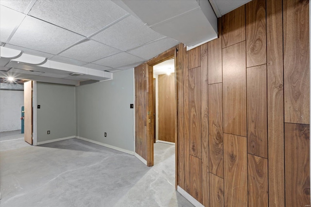 finished below grade area with wooden walls