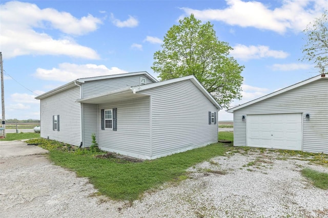 view of home's exterior with driveway
