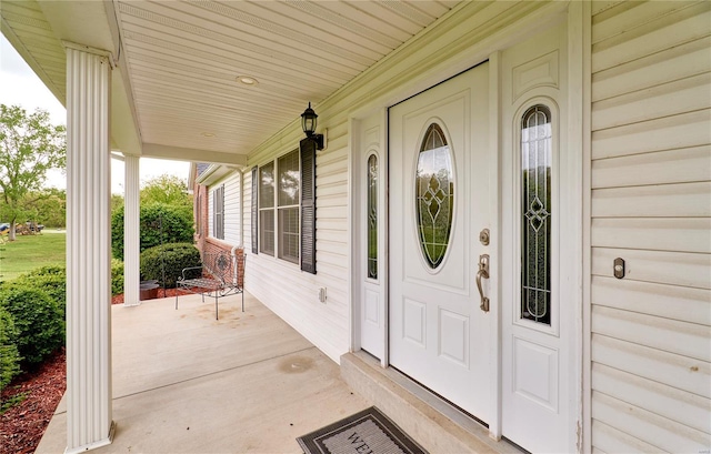 doorway to property with covered porch