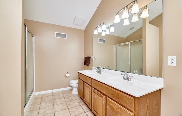 bathroom with a sink, a stall shower, and visible vents