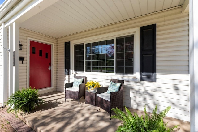 property entrance featuring covered porch