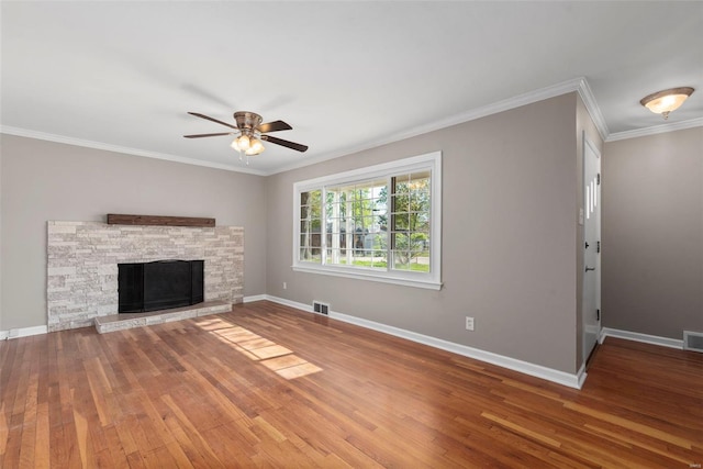 unfurnished living room featuring ceiling fan, baseboards, hardwood / wood-style floors, and visible vents