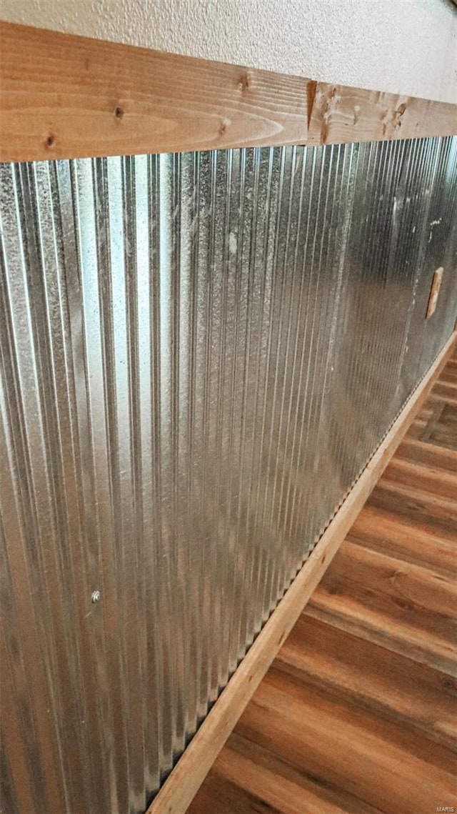 details featuring wood finished floors