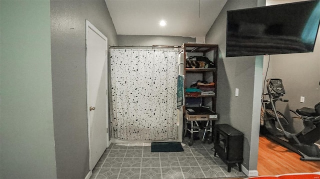 bathroom with recessed lighting and a shower with shower curtain