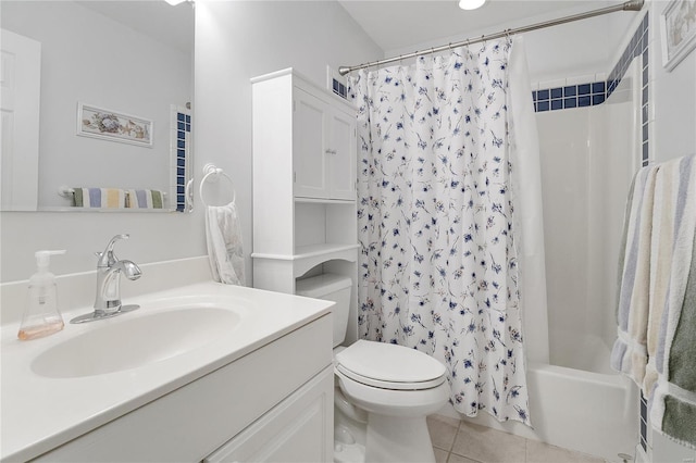 full bath with shower / bath combo, tile patterned floors, vanity, and toilet