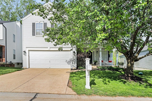 obstructed view of property with a garage, covered porch, concrete driveway, and a front yard
