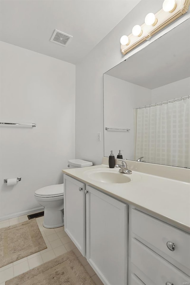 full bath with vanity, tile patterned floors, toilet, and visible vents