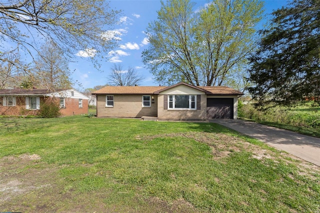 ranch-style house with a garage, concrete driveway, and a front lawn