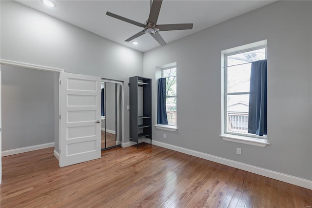 unfurnished bedroom featuring recessed lighting, baseboards, ceiling fan, and light wood finished floors