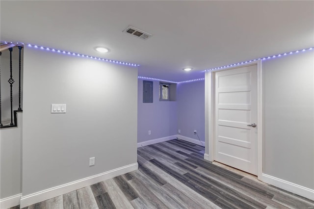 spare room with recessed lighting, baseboards, visible vents, and wood finished floors