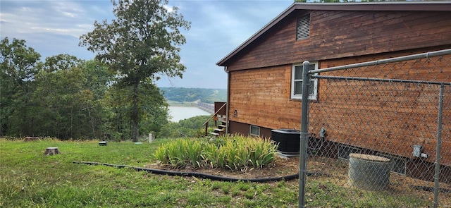 view of property exterior with central AC unit