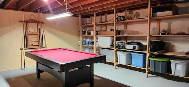 game room with pool table and concrete floors