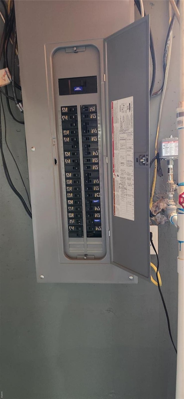 utility room with electric panel