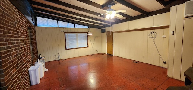 interior space featuring brick wall, tile patterned floors, a ceiling fan, visible vents, and vaulted ceiling with beams
