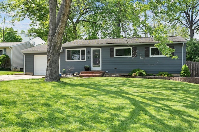 single story home with a garage, concrete driveway, and a front yard