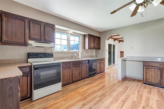 kitchen featuring under cabinet range hood, arched walkways, dishwasher, a sink, and electric range oven