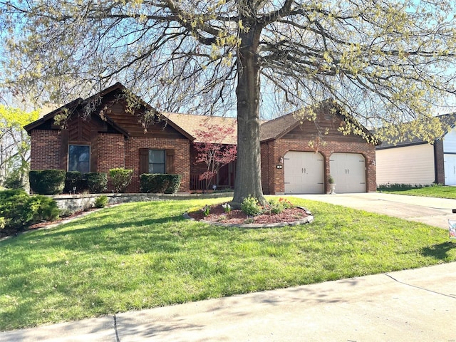 ranch-style house featuring a garage, a front yard, driveway, and brick siding