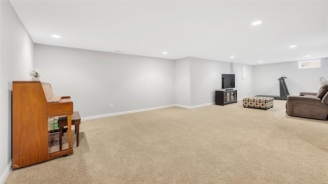 living area featuring visible vents, baseboards, recessed lighting, and carpet