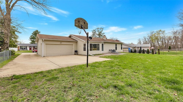view of front of property with a garage, a patio, a front yard, fence, and concrete driveway