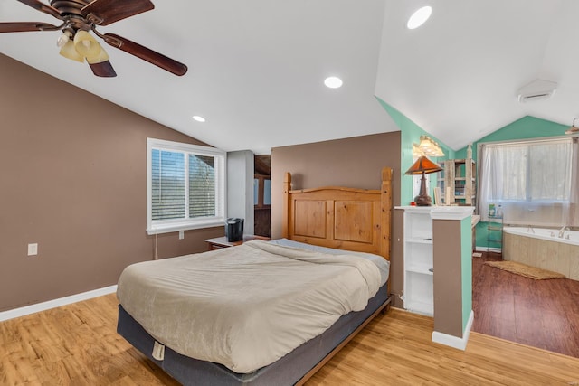 bedroom with baseboards, recessed lighting, wood finished floors, and lofted ceiling