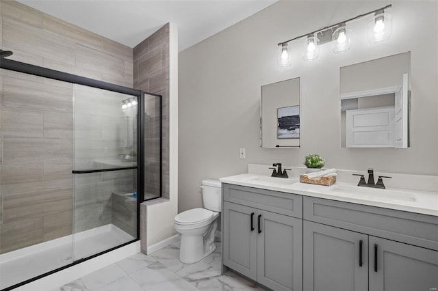 full bathroom featuring a sink, toilet, marble finish floor, and a stall shower