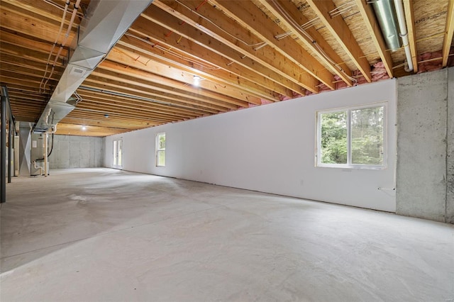 below grade area featuring heating unit