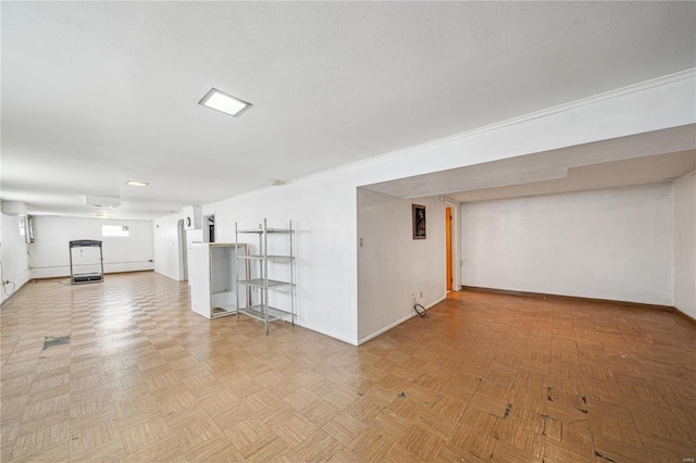 below grade area featuring baseboards