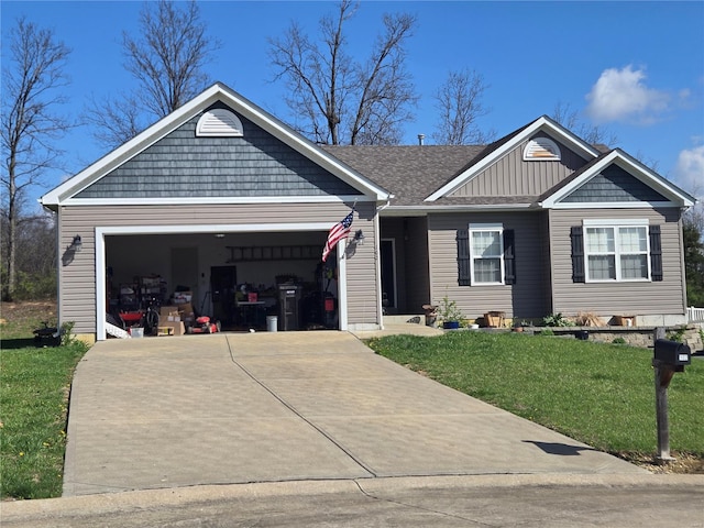 view of front of house featuring board and batten siding, concrete driveway, a front yard, and a garage