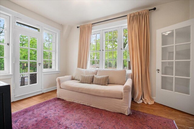 sitting room featuring wood finished floors
