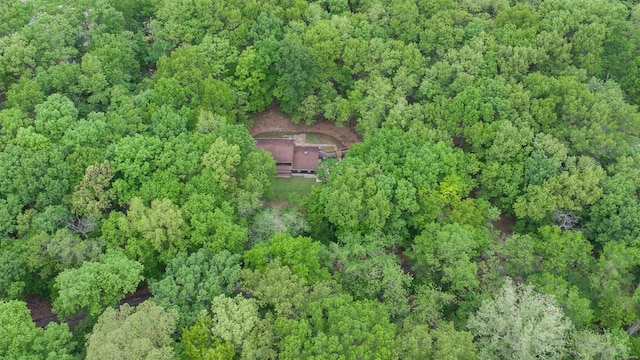 bird's eye view featuring a forest view