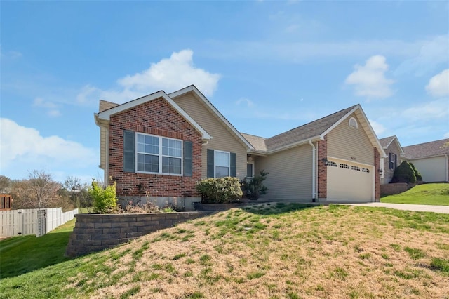 ranch-style house with a garage, brick siding, fence, and a front lawn