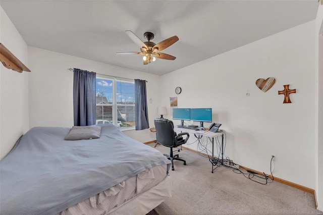 bedroom featuring carpet, baseboards, and ceiling fan