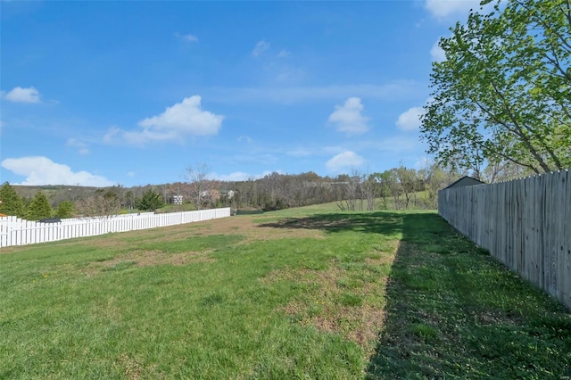 view of yard featuring fence
