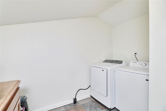 laundry area with washer and dryer, laundry area, and baseboards