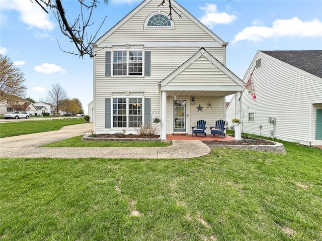 rear view of house with a yard