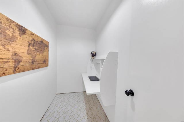 bathroom with tile patterned floors
