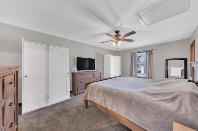 bedroom with carpet floors and a ceiling fan