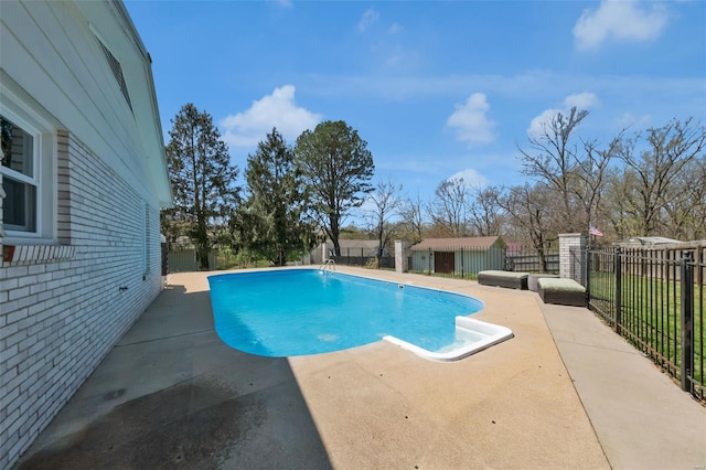 view of pool featuring fence, a fenced in pool, and a patio