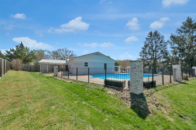pool featuring a yard and a fenced backyard