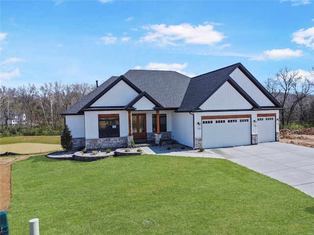 modern farmhouse style home with stone siding, a front lawn, an attached garage, french doors, and driveway