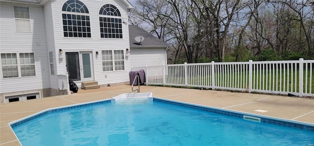 view of pool featuring a fenced in pool, a patio, entry steps, and fence