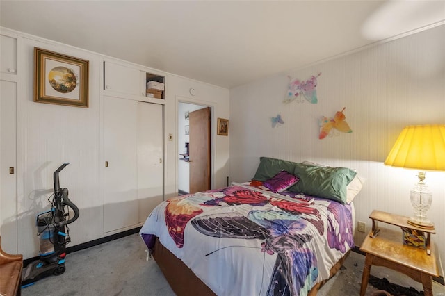 carpeted bedroom with a closet