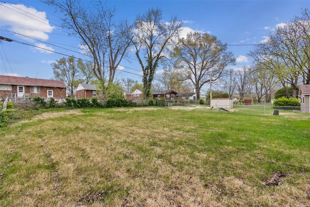 view of yard featuring fence