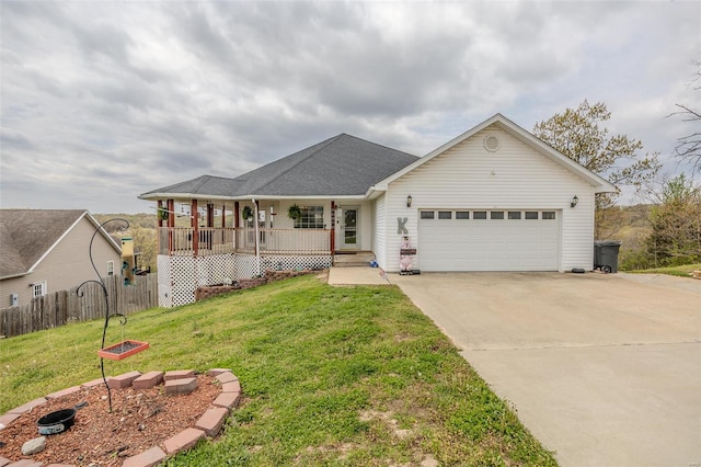 ranch-style home with concrete driveway, covered porch, fence, an attached garage, and a front yard