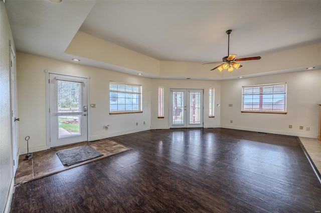 interior space with recessed lighting, wood finished floors, baseboards, and ceiling fan