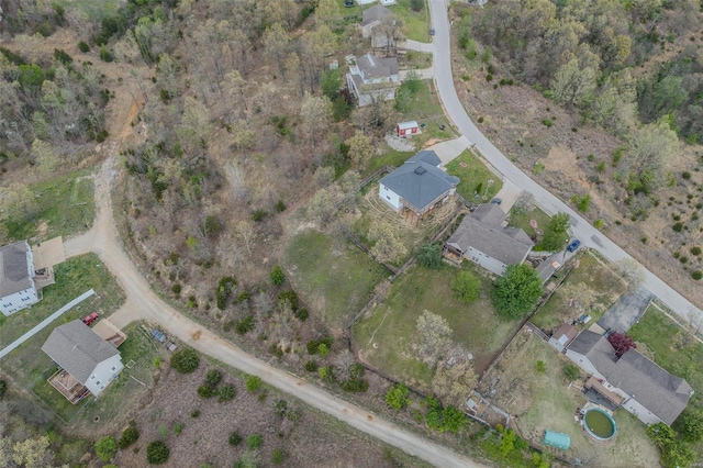 birds eye view of property with a residential view